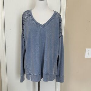Jane and Delancey Faded Blue V‑Neck Pullover with Crochet Shoulder Detail